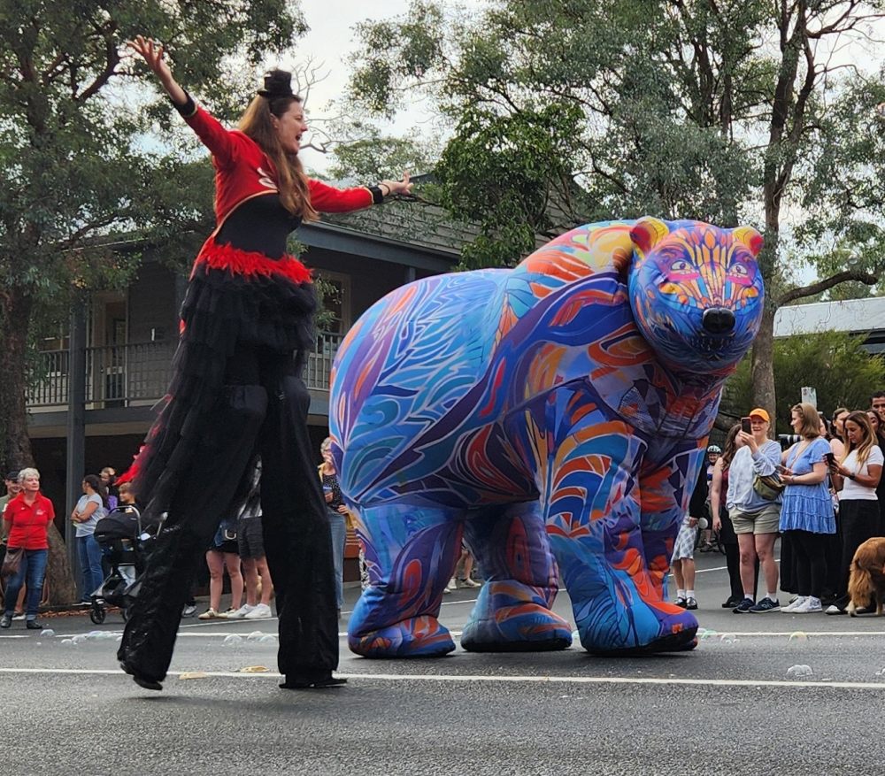 Warrandyte Festival Stilt Walker Inflatable Bear Parade